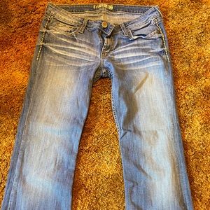 Buckle Stella boot cut jeans in size 29x35 1//2.